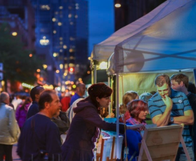 People walking at a market outside